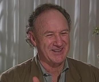 Gene Hackman w scenie filmowej, ukazujący jego intensywność i charyzmę.