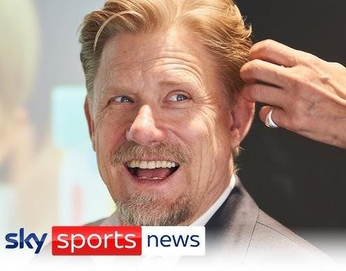 Peter Schmeichel wykonujący efektowną interwencję bramkarską w barwach Manchesteru United.